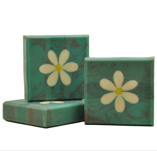 Daisy on a green brown background soap