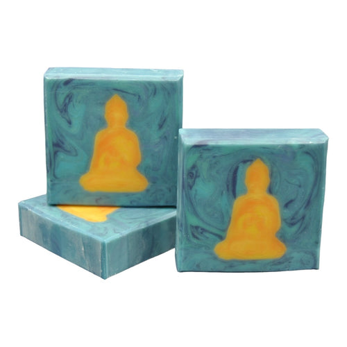 Yellow buddha on blue background soap seife