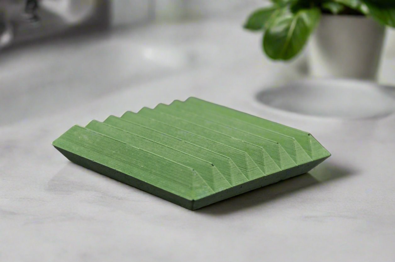 Handgemachte grüne Beton Seifenschale im minimalistischen Design