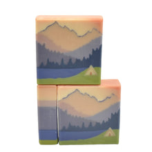 Lade das Bild in den Galerie-Viewer, Camping soap tent in fron t of lake and mountains in pink and violet green grass seife
