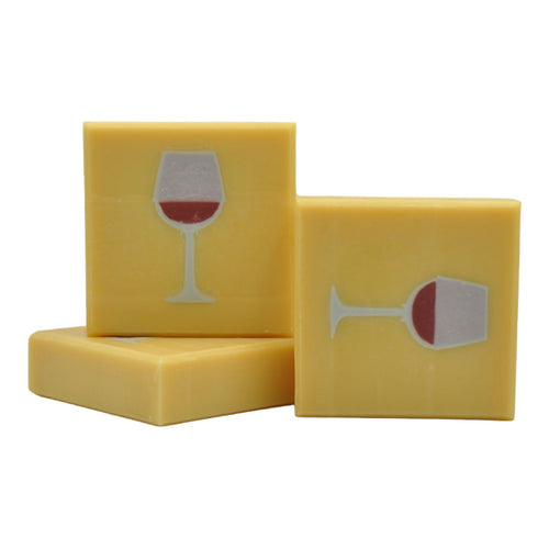 red wine glass on yellow background soap wein glass seife
